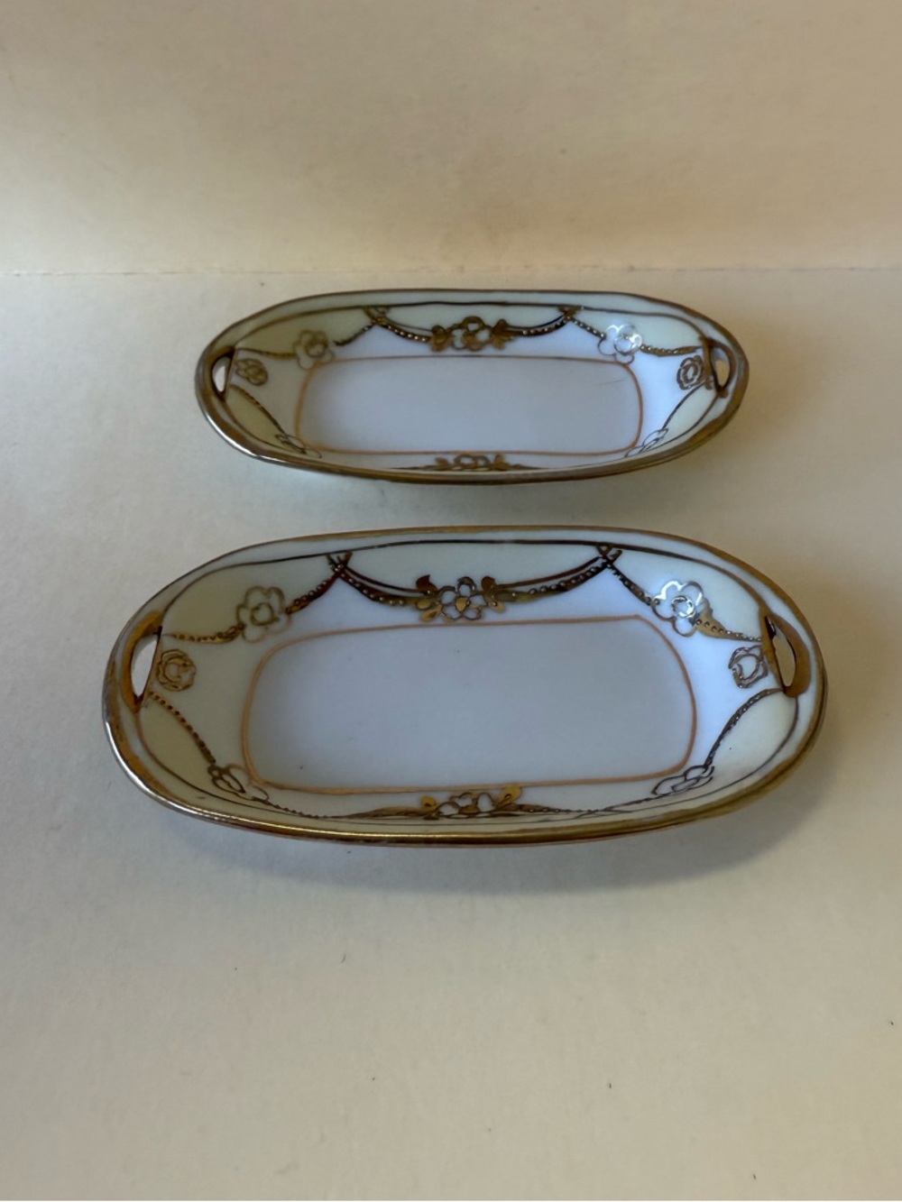 Set of 2 Antique Nippon Porcelain White and Gold Floral Salt Dishes.